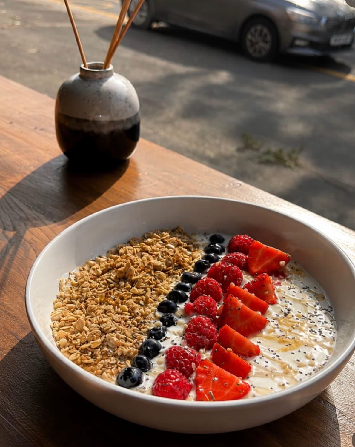 Granola, yoghurt, and fresh berries bowl